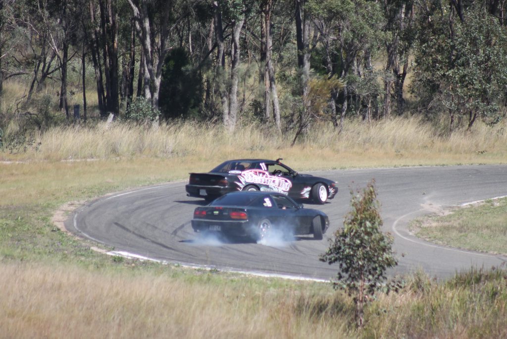 SHARP CORNER: Car 11 driver Bruce Donnelly had car 16 driver Ron Lange in close pursuit during their run at the drifts on Sunday. SHARP CORNER: Car 11 driver Bruce Donnelly had car 16 driver Ron Lange in close pursuit during their run at the drifts on Sunday.